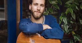 Hire a singing guitarist